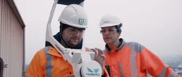 Holcim digital twin Switzerland plant_two men testing equipment