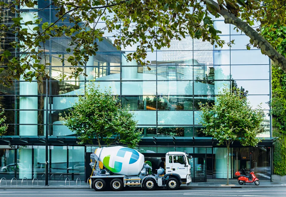 EcoPact truck in front of building