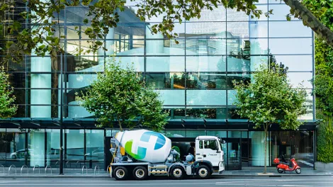EcoPact truck in front of building