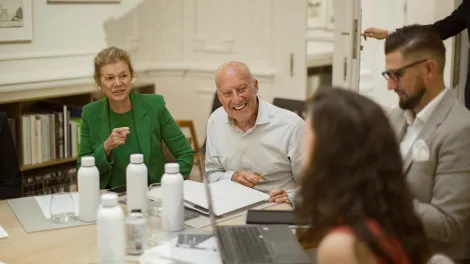 Norman Foster_Holcim Shelter Workshop_people behind table
